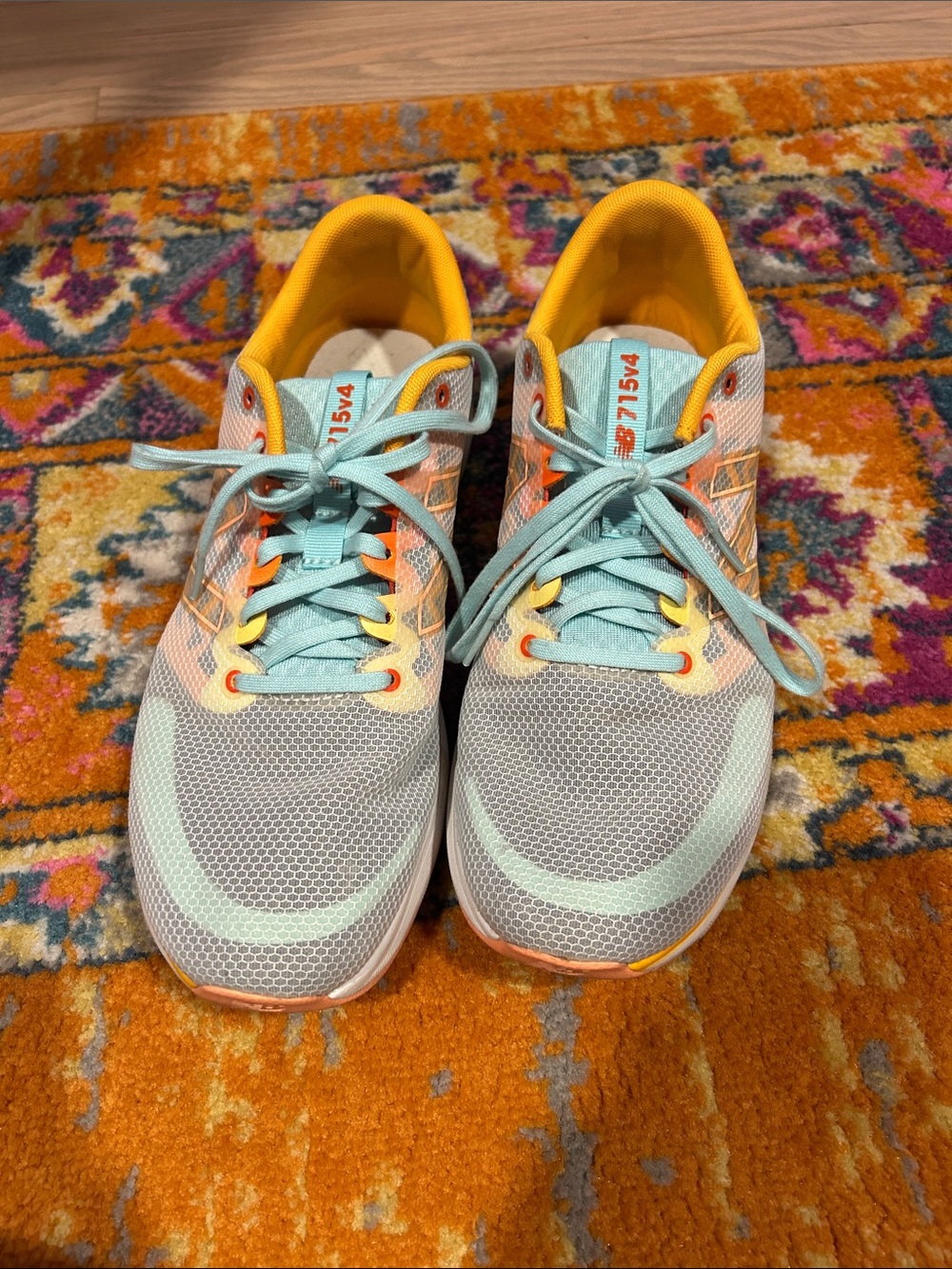 New Balance Women's Athletic Sneakers in Light Teal and Orange